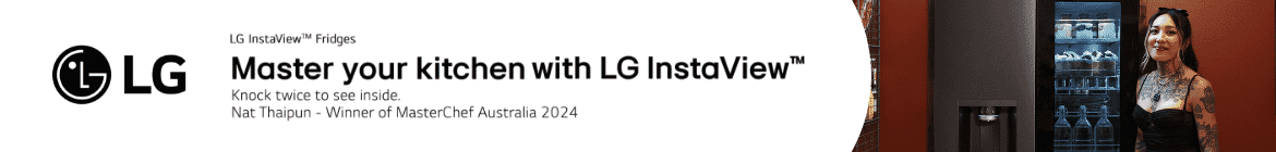 Nat Thaipun standing in front of LG Fridge